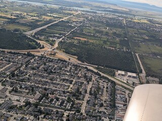 British Columbia, Canada. In the plane window. View of Greater Vancouver from airplane