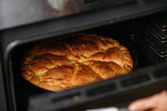 Cooked Albanian savory pie burek pie with zucchini and che
