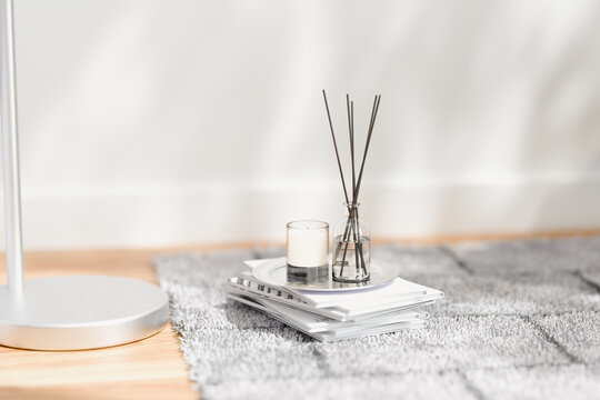 Cozy living room with fragrance scent diffuser and candle.