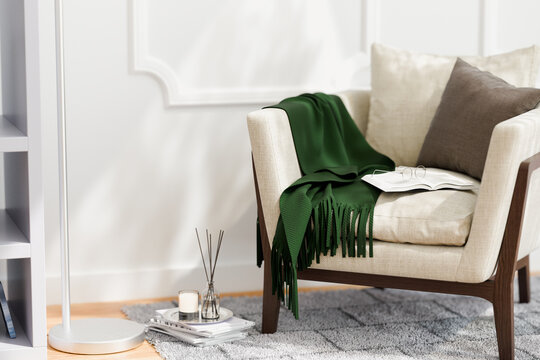 Cozy living room with fragrance scent diffuser and candle.