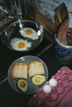 Breakfast time, eggs and avocado