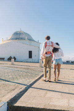 Family walking near Ermida de S&atilde;o Sebasti&atilde;o in Ericeira