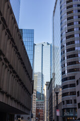Fototapeta premium Street-Level View of Boston’s Glass and Stone Buildings