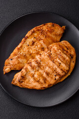 Grilled chicken fillet with salt, spices and herbs