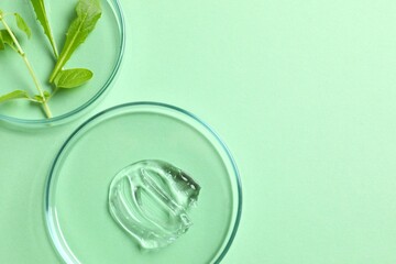 Petri dishes, cosmetic gel swatches and plants on color background, copy space. Bio science research, biochemistry, organic skin care concept
