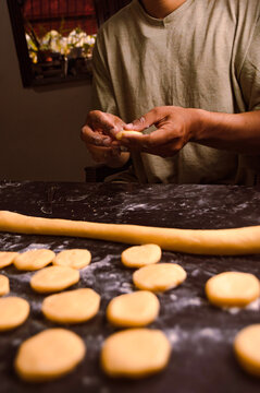 Artisan baker molding cookie dough. Food photography