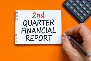 2nd quarter financial report symbol. Concept words 2nd quarter financial report on beautiful white note. Beautiful orange background. Business 2nd quarter financial report concept. Copy space.