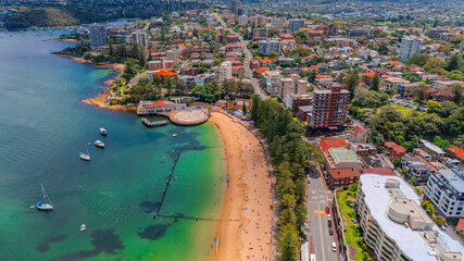 4 December 2024 beautiful Aerial View of Manly Beach and Sydney harbour with manly houses on a warm summer day blue skies Sydney NSW Australia
