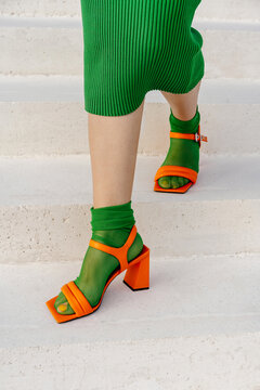 Green sheer socks with hole and orange heels