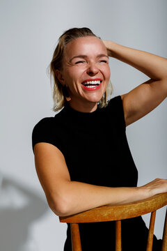 A joyful woman laughing