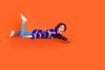 Photo of flying arms like wings into discount prices funny girl wearing winter season clothing...