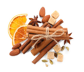 Different aromatic spices isolated on white, top view. Christmas season