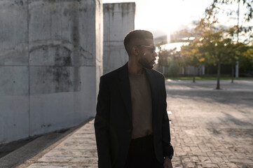 Pensive entrepreneur in urban architecture