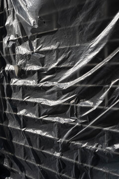 shop shutter wrapped in plastic