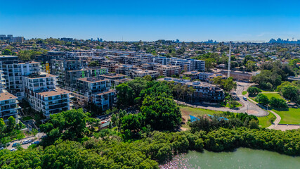 Panorama Aerial view above Rhodes with views to Meadowbank and Olympic park and Wentworth Point and Concord West with Parramatta River in Sydney NSW Australia