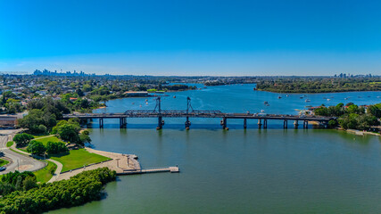 Fototapeta premium Panorama Aerial view above Rhodes with views to Meadowbank and Olympic park and Wentworth Point and Concord West with Parramatta River in Sydney NSW Australia