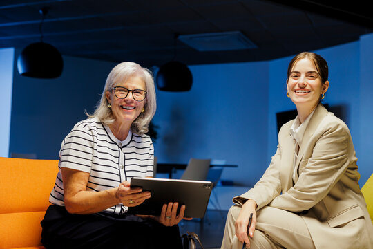 Financial advisor showing investment plan to senior client