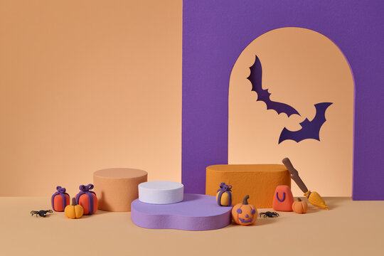 Colorful Halloween Display with Bats and Pumpkins
