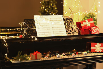 Piano with Christmas decor and gift boxes