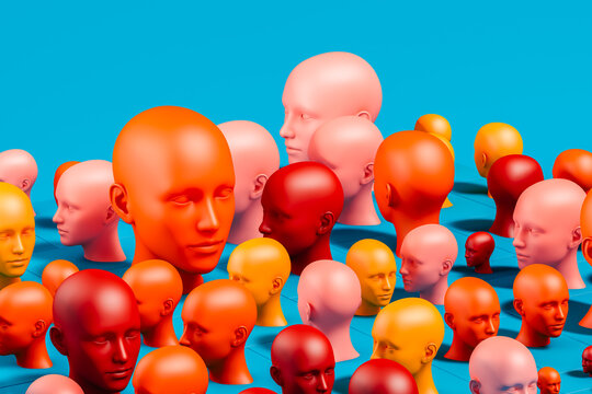 Exploring diversity with colorful head sculptures on a blue backdrop