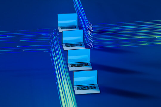 Laptops with data cables on a blue background