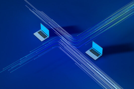 Laptops on a blue background show data flow online