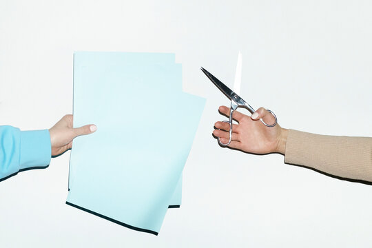 People playing rock paper scissors game with real objects with flash