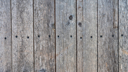Weathered wooden planks arranged in a rustic pattern