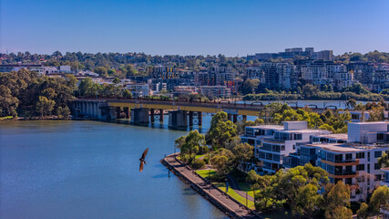 Panorama Aerial view above Rhodes with views to Meadowbank and Olympic park and Wentworth Point and Concord West with Parramatta River in Sydney NSW Australia