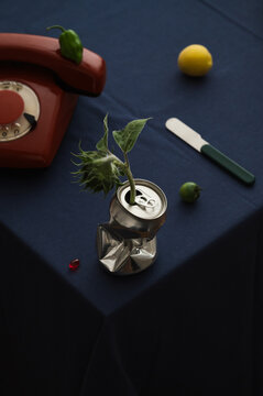 Still life with a dented aluminum can