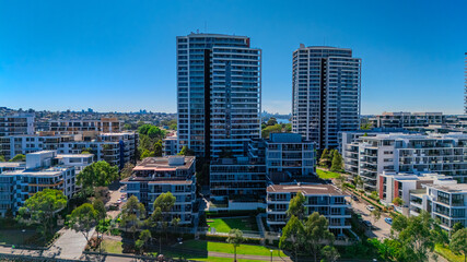 Panorama Aerial view above Rhodes with views to Meadowbank and Olympic park and Wentworth Point and Concord West with Parramatta River in Sydney NSW Australia