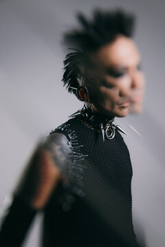 Edgy punk fashion with spikes and blurred effect