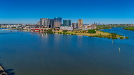 Obraz premium Panorama Aerial view above Rhodes with views to Meadowbank and Olympic park and Wentworth Point and Concord West with Parramatta River in Sydney NSW Australia