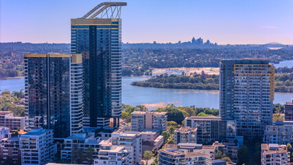 Naklejka premium Panorama Aerial view above Rhodes with views to Meadowbank and Olympic park and Wentworth Point and Concord West with Parramatta River in Sydney NSW Australia