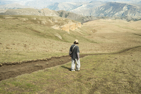Girl going down the mountain hill