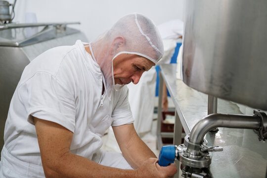 Dairy worker at work