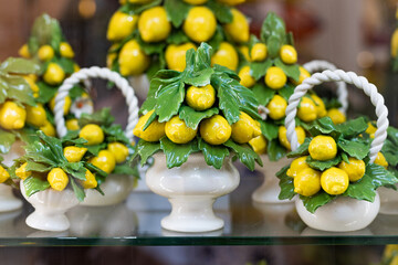 Beautiful porcelain vases with lemons in a store on the island of Capri.