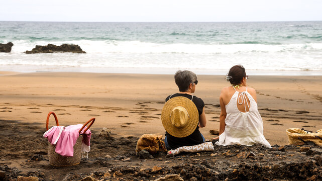 Mature Women looking at Ocean 
