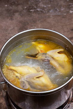 Chicken and duck soup cooking,closeup