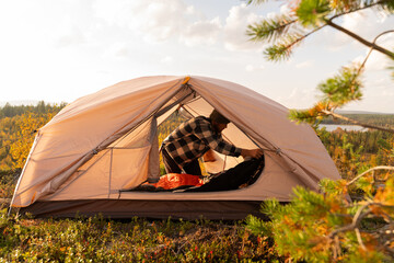 Man Setting Up Tent