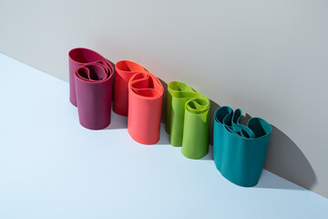 Vibrant fitness elastic bands for yoga and exercise setups