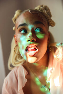 Expressive Woman with Blonde Braids