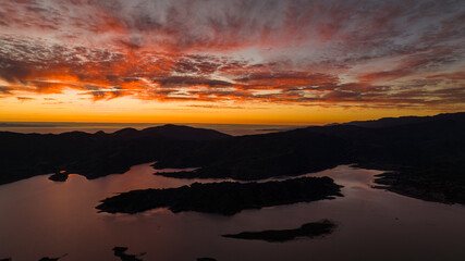 DECEMBER 2023, OJAI, CA - Drone view of Lake Casitas, Mountains and Pacific Ocean in Ojai CA.