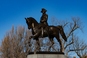 DECEMBER 2023, BOSTON, MA., USA - George Washington Statue in downtown Boston with skyline in...