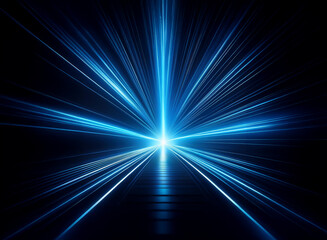 Fototapeta premium Abstract image of bright blue light streaks radiating from a central point, creating a sense of speed and movement. The dark background enhances the vibrant glow.