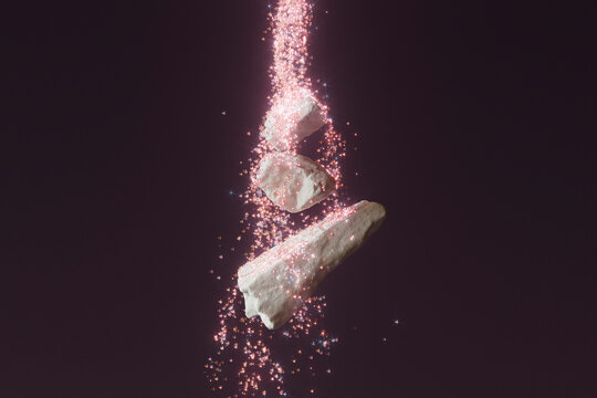 Cascading particles in surreal stone arrangement