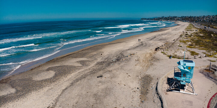 APRIL 2024, SOLANA BEACH, SOUTHERN CALIFORNIA - lifeguard tower and white sandy beach at Solana Beach, California
