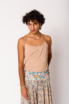 A young person poses confidently