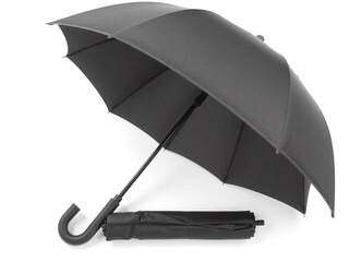 Fototapeta premium A compact, foldable umbrella in matte black with a rubber handle, fully closed and lying flat on a white background.