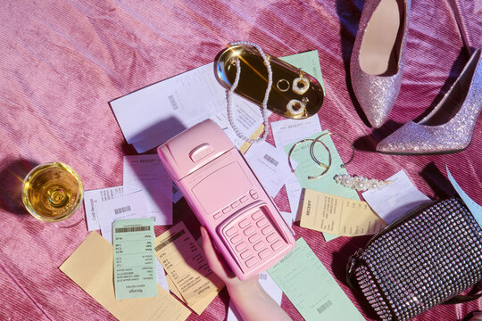 Elegant Shopping Scene with Glitter Shoes and Pink Payment Terminal